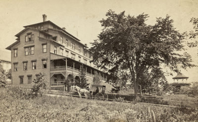 Acadian Hotel at the corner of Perkins and Pleasant Streets, torn down in 1943. A.H. Folsom, photographer