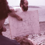 Alaric Faulkner explaining the diagram of Fort Pentagoet at the dig site, 1982