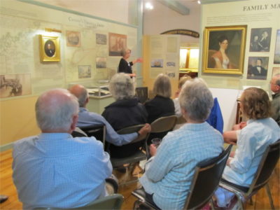 Curator Paige Lilly leads an exhibit talk about Risky Business: Square-Rigged Ships and Salted Fish